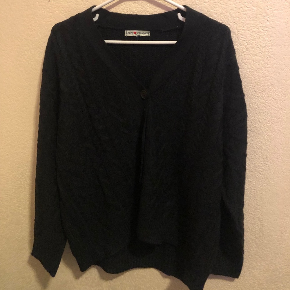 Knitted  grandpa sweater with stitched heart detail